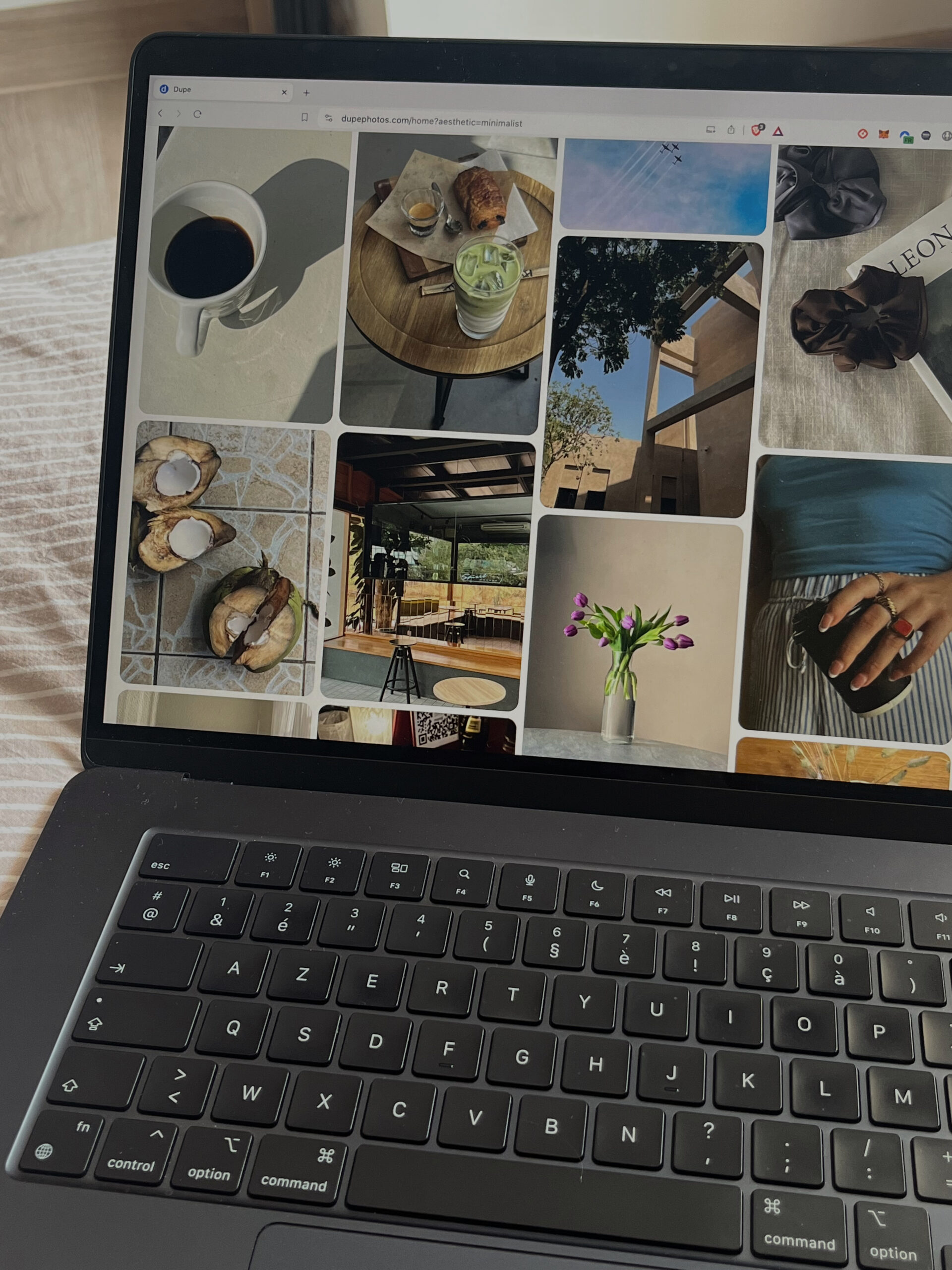 Laptop displaying a Pinterest feed with curated visuals, representing Pinterest management and blogging management strategies for creatives building long-term traffic
